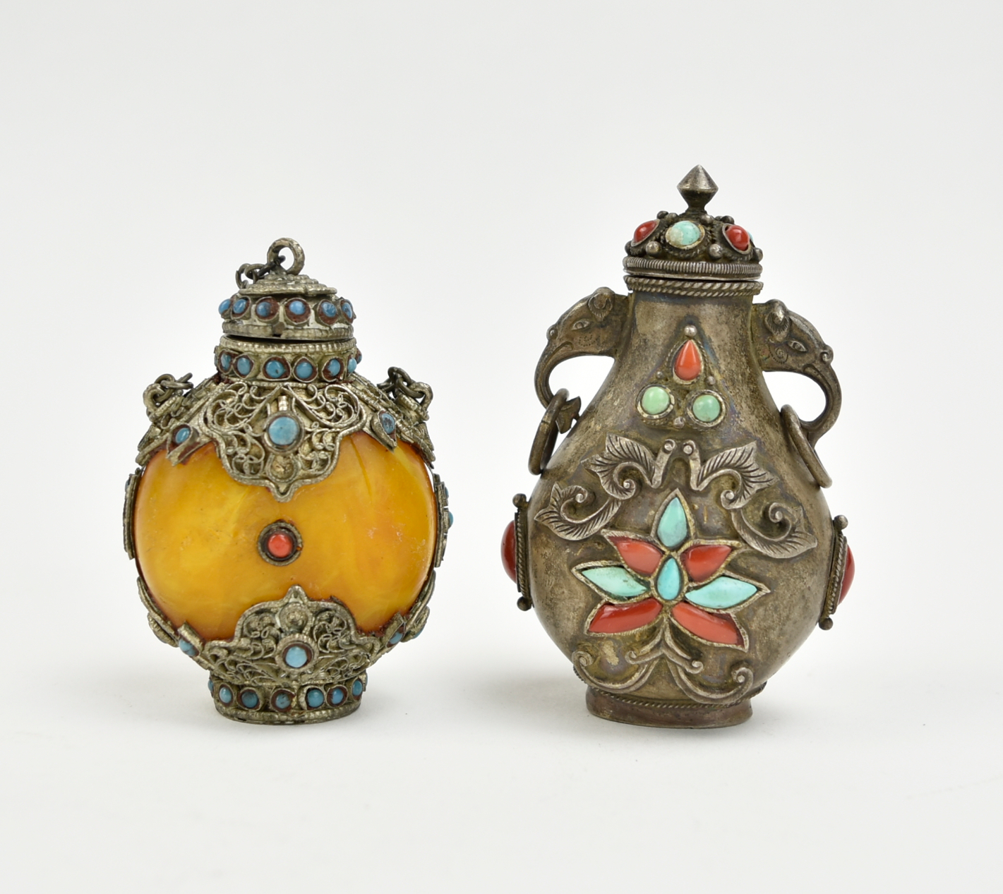 Appraisal: two snuff bottles with jewel stones and metal body with