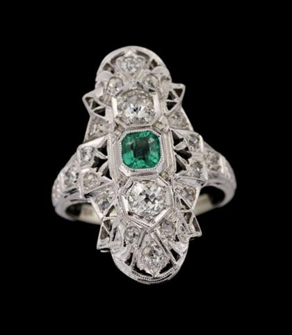 Appraisal: White gold emerald and diamond plaque ring Long navette shaped