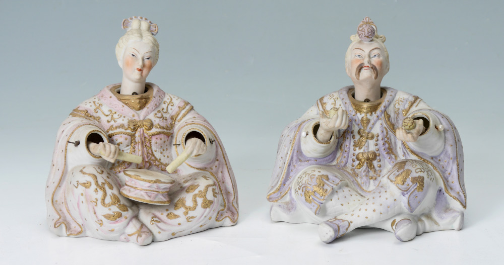 Appraisal: ARDAULT BISQUE NODDER FIGURES Man and woman dressed as Asian