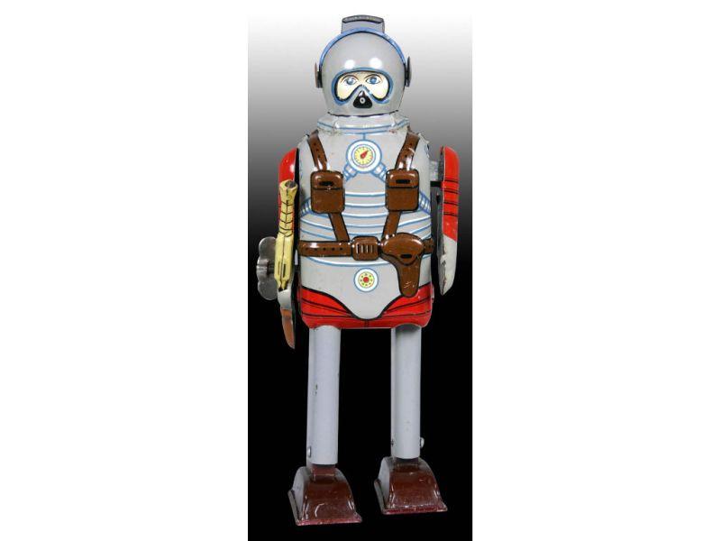 Appraisal: Japanese Tin Wind-Up Space Commando Robot Toy Description - ''