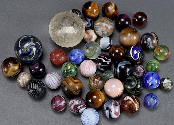 Appraisal: A COLLECTION OF OVER EARLY HAND MADE MARBLE A COLLECTION