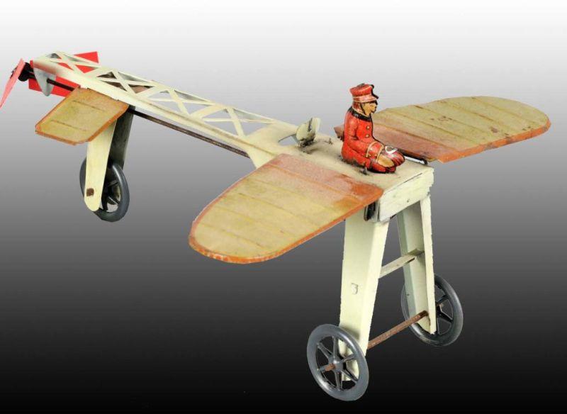 Appraisal: German Guntherman Flapping Wing Airplane Toy Description Tin wind-up Original