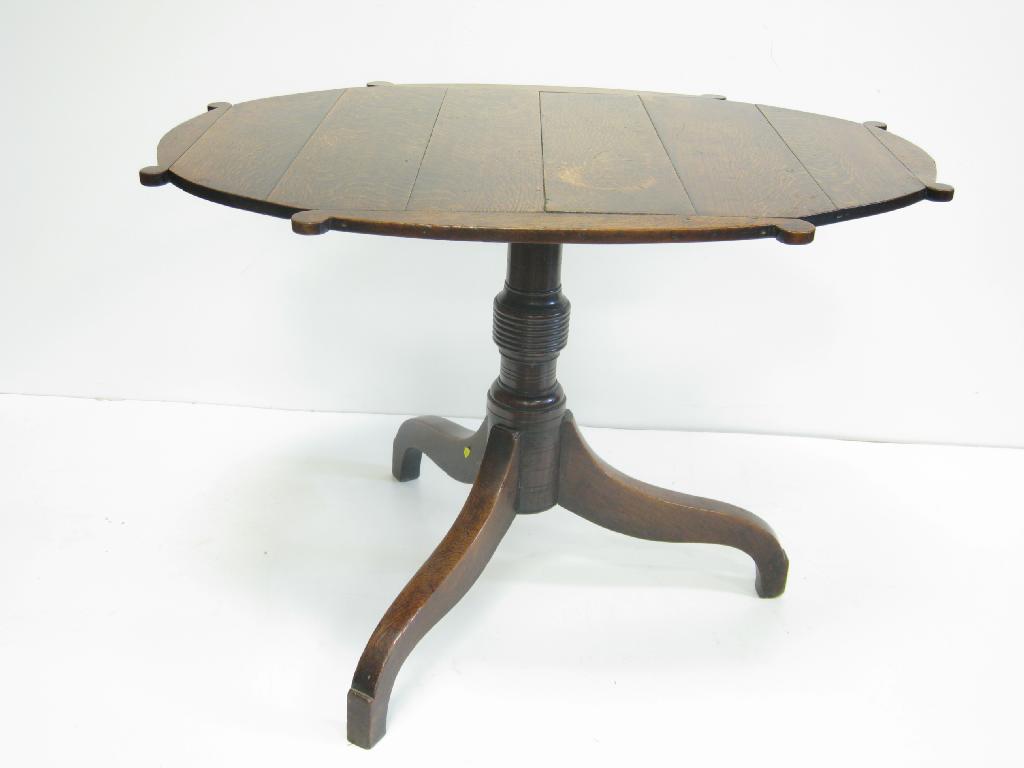 Appraisal: An antique oak Breakfast Table of oval form having carved