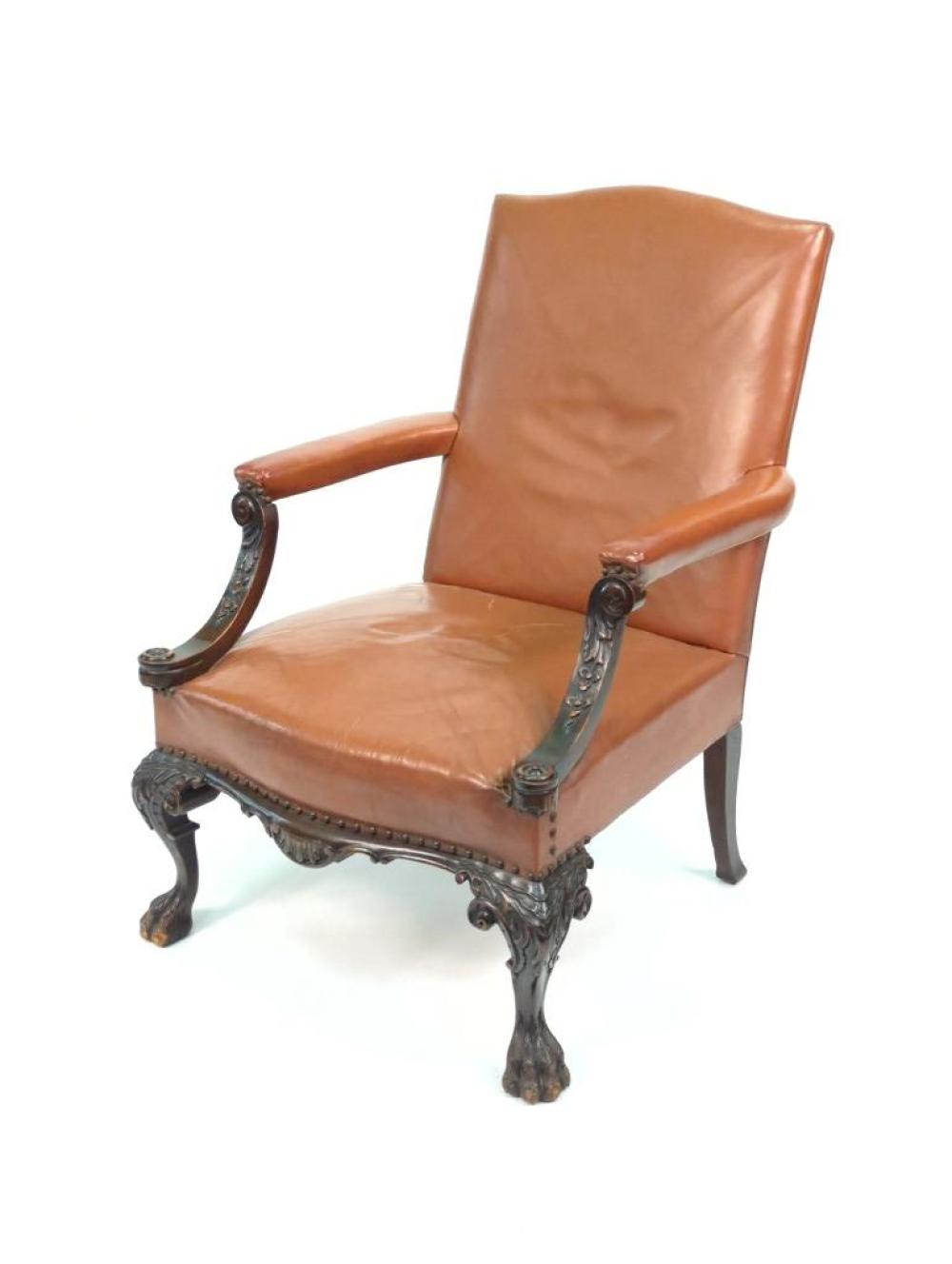 Appraisal: ITALIAN RENAISSANCE REVIVAL LEATHER COVERED LOUNGE CHAIR WITH ORNATE CARVED