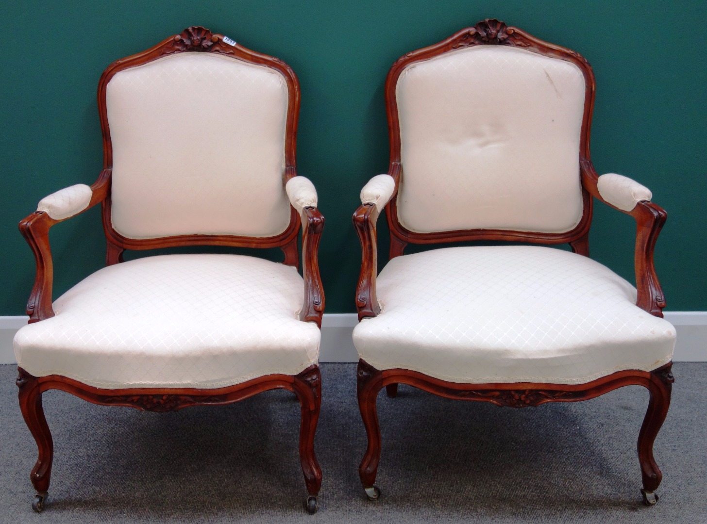 Appraisal: A set of four Louis XV style stained beech fauteuils