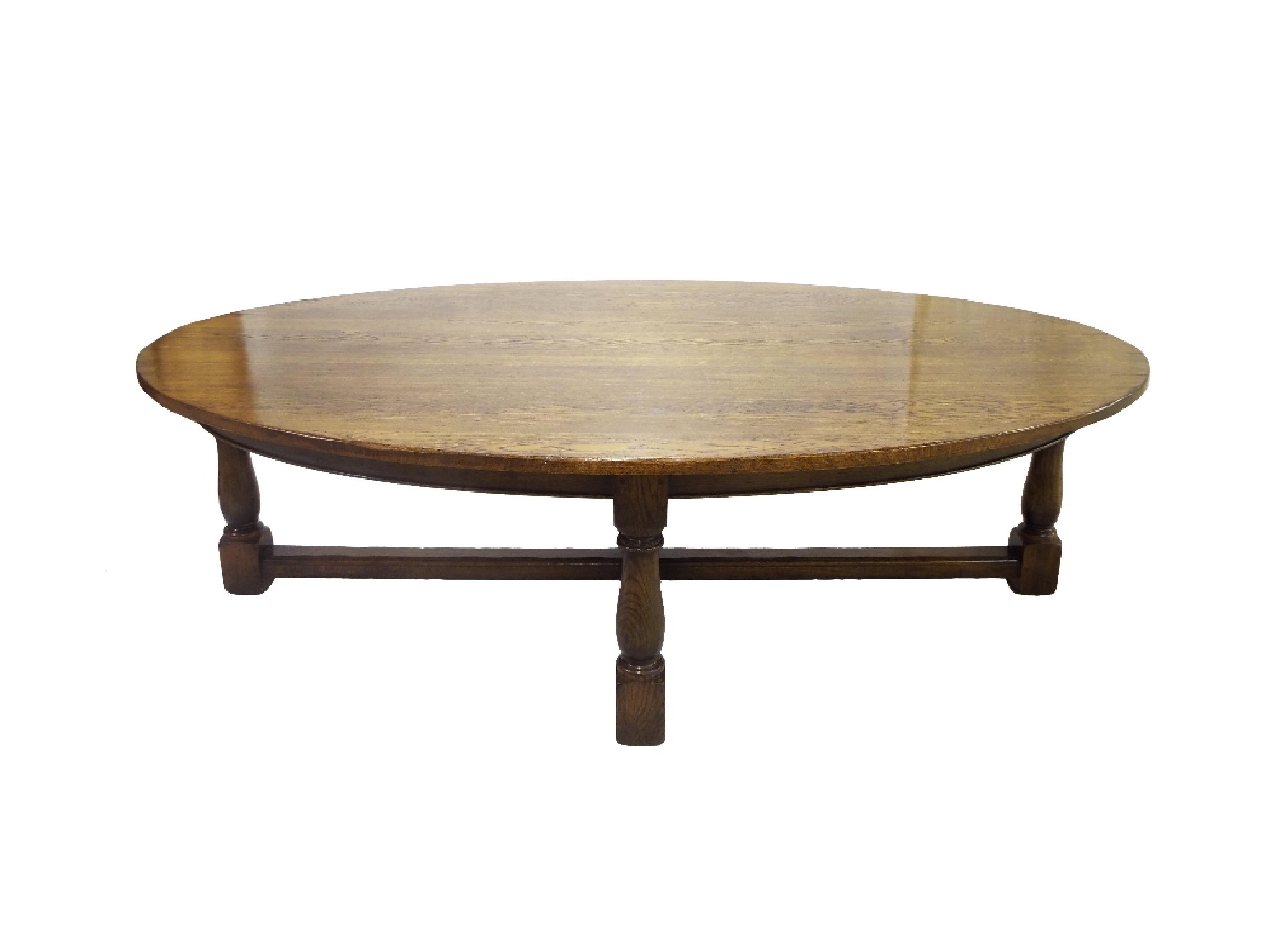 Appraisal: Large bespoke oak oval refectory table upon baluster supports united