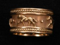 Appraisal: K Yellow Gold Band with Horses K yellow gold band