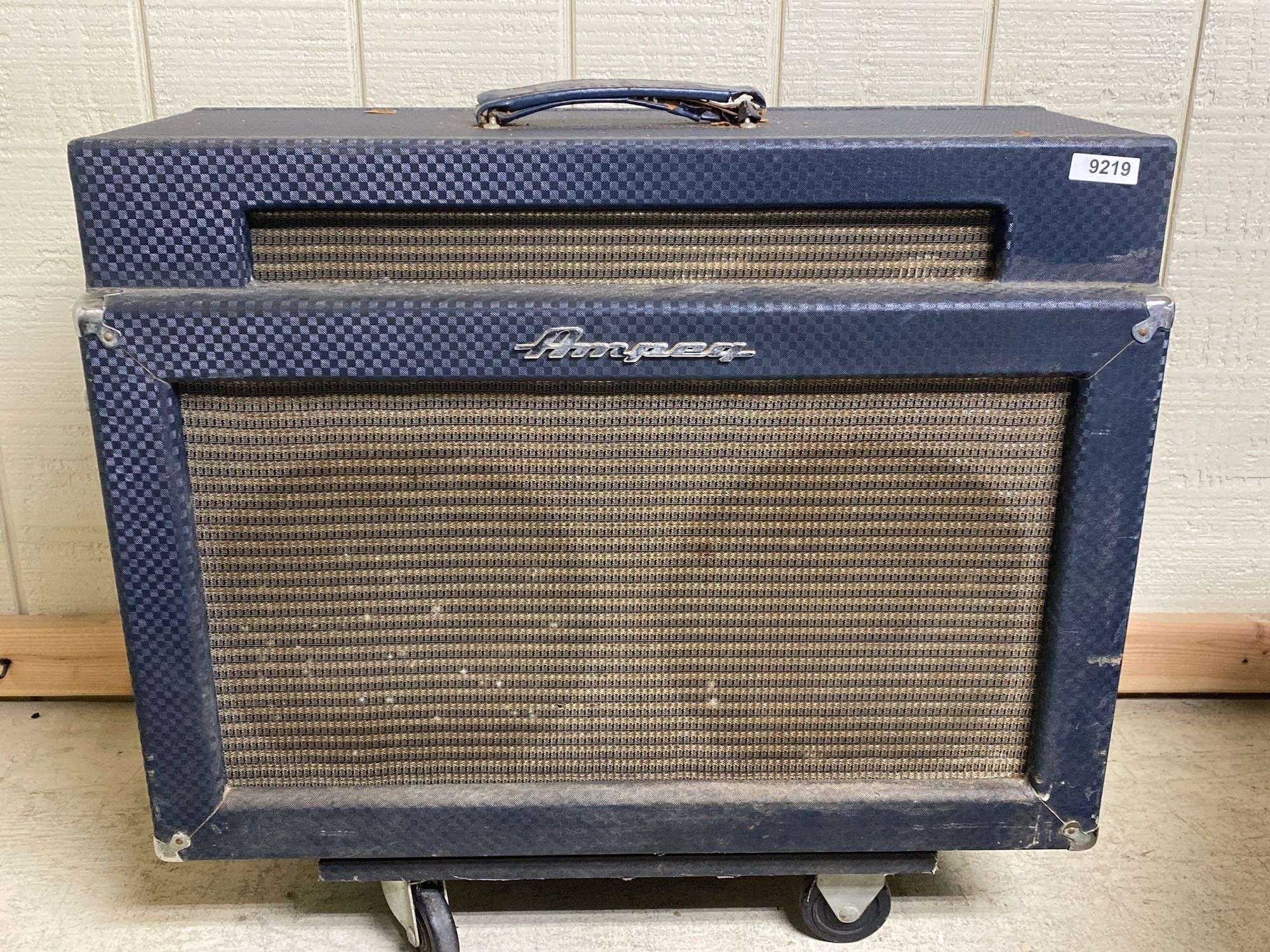 Appraisal: Vintage Ampeg x cabinet on wheelsVintage Ampeg x cabinet on