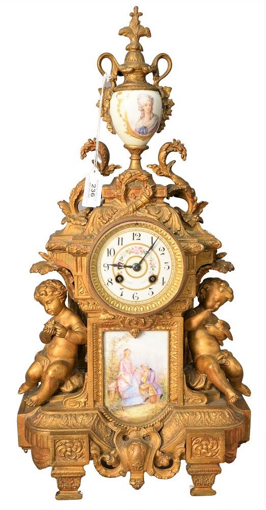 Appraisal: French Style Figural Mantle Clock having two putti forms painted