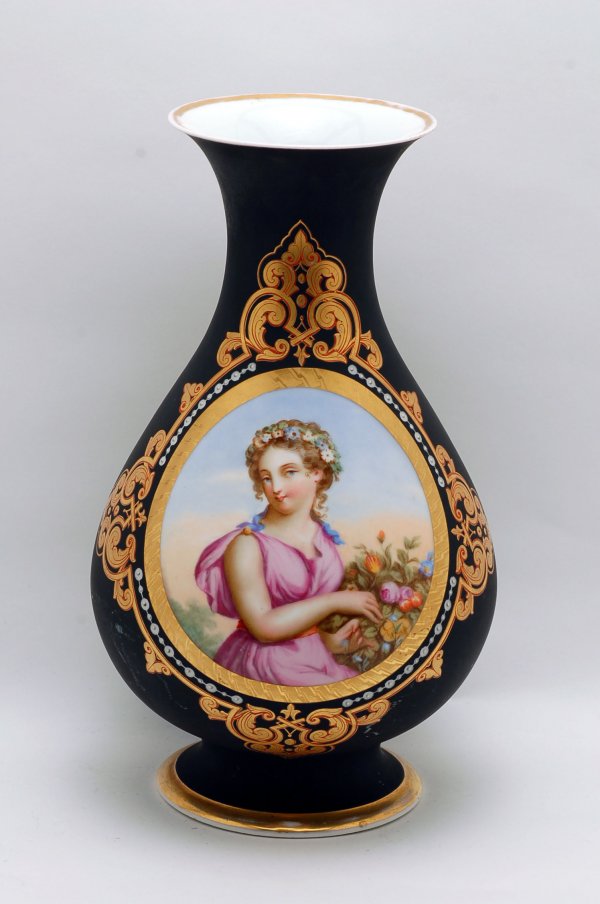 Appraisal: Porcelain portrait vase exterior with black matte finish center handpainted