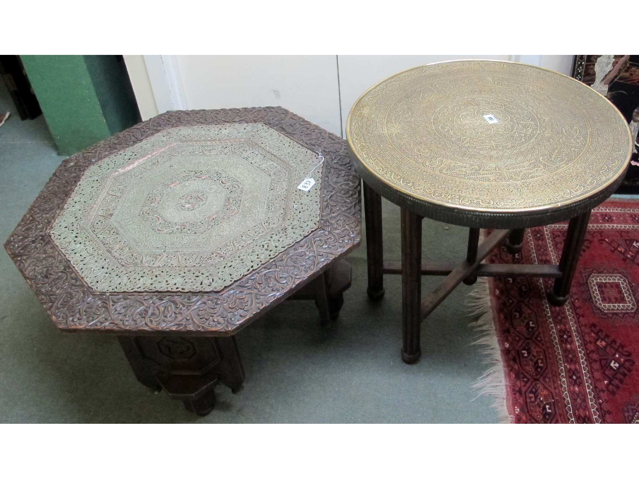 Appraisal: An inlaid brass topped table and an Indian octagonal low