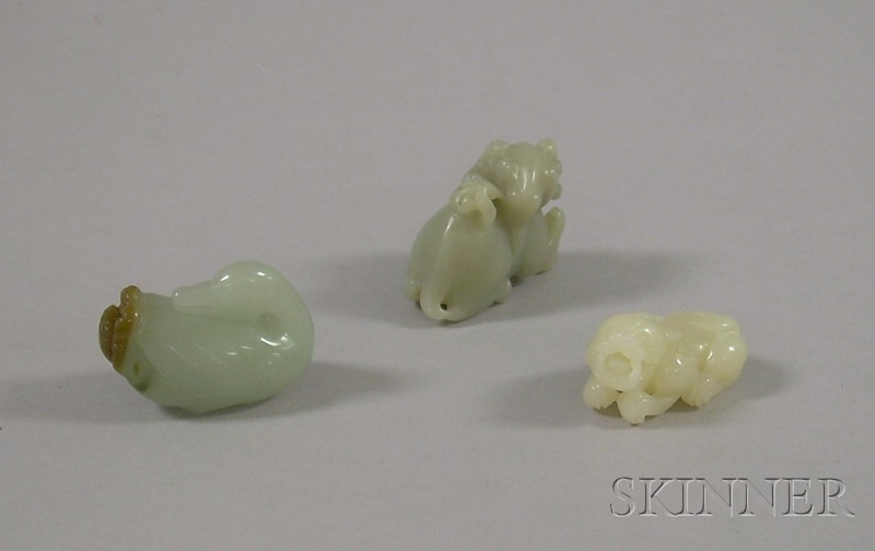 Appraisal: Three Carved Jade Figures a sitting bird a horned animal