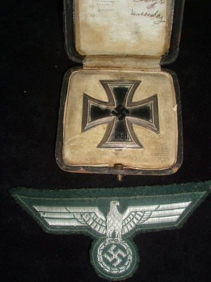 Appraisal: An Iron Cross dated with pin back together with a