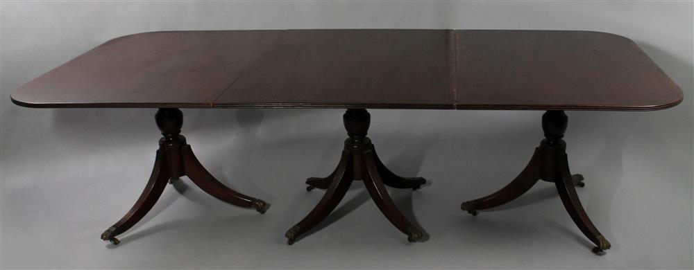 Appraisal: REGENCY STYLE MAHOGANY THREE PEDESTAL DINING TABLE the top with