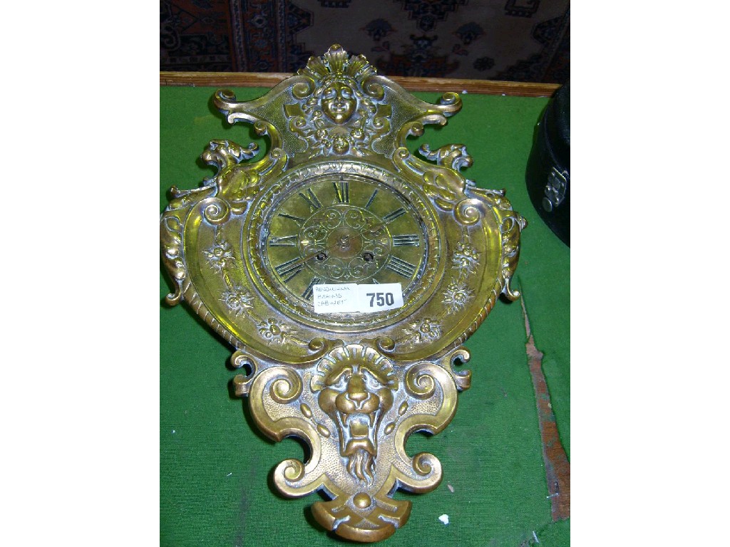 Appraisal: A late th century brass wall clock with shaped and