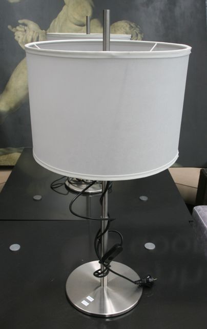 Appraisal: A pair of stainless steel table lamps cm high together