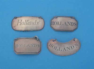 Appraisal: Four various 'HOLLANDS' wine labels all George III mixed maker's