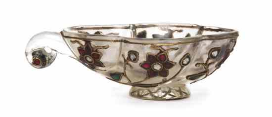 Appraisal: A Mughal Rock Crystal Coupe of lobed form having applied