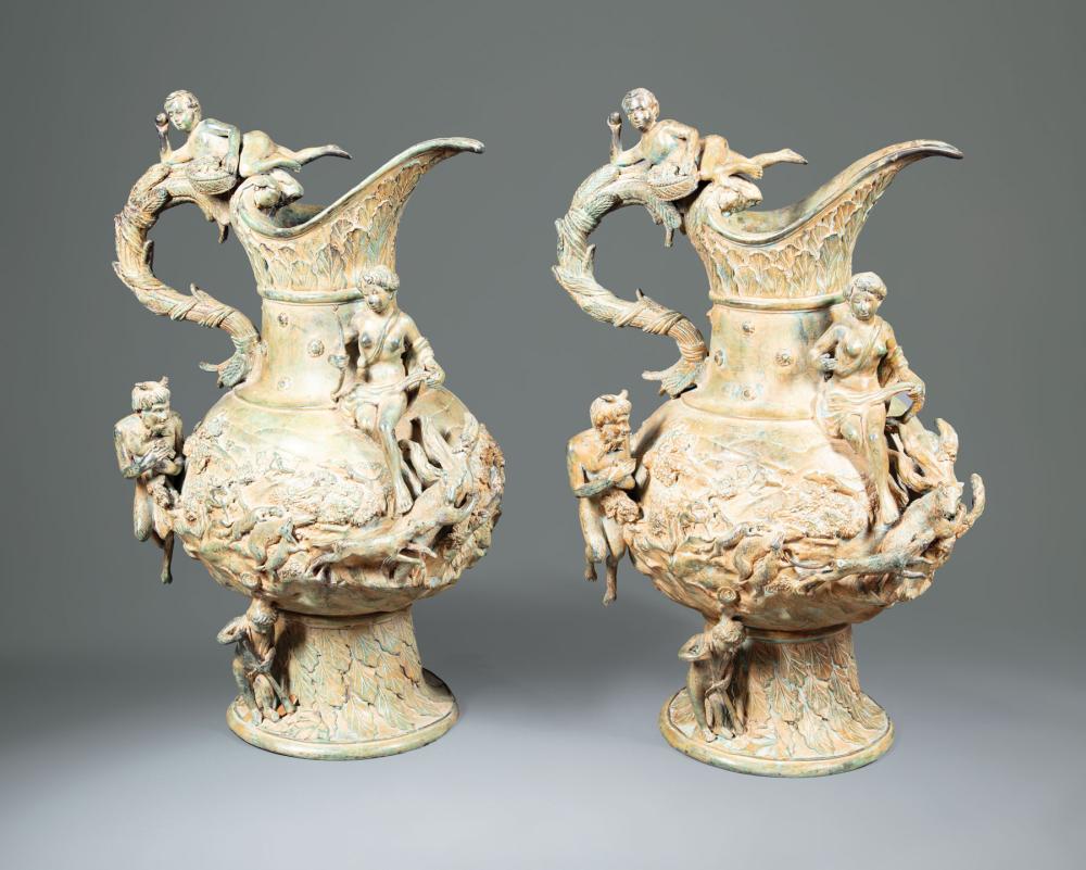 Appraisal: Pair of Neoclassical-Style Bronze Ewers cast with figures gods and