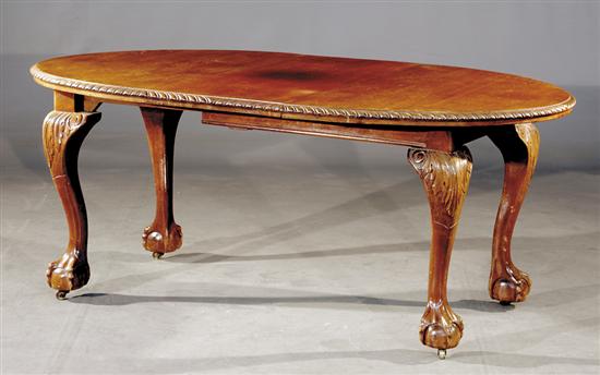 Appraisal: Georgian style carved mahogany dining table late th early th