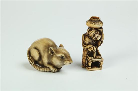 Appraisal: TWO IVORY NETSUKES Japan st half- th century Seated rat