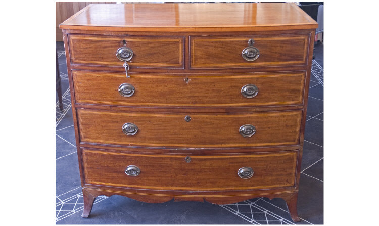 Appraisal: George III Bow-fronted chest of drawers with two aligned and