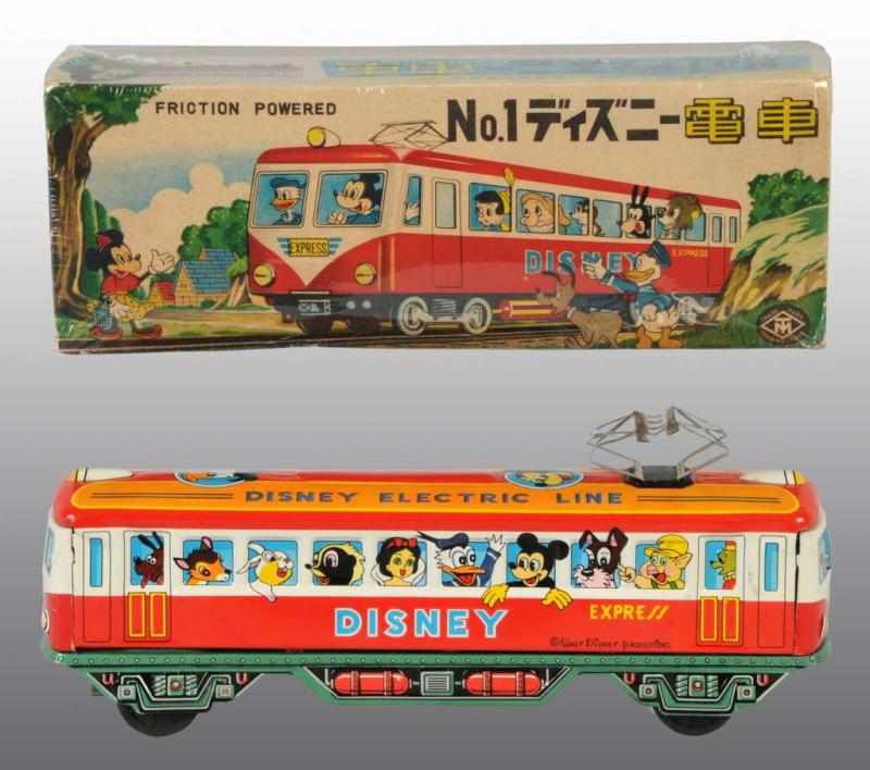 Appraisal: Tin Walt Disney Train Express Friction Toy Description Japanese Working