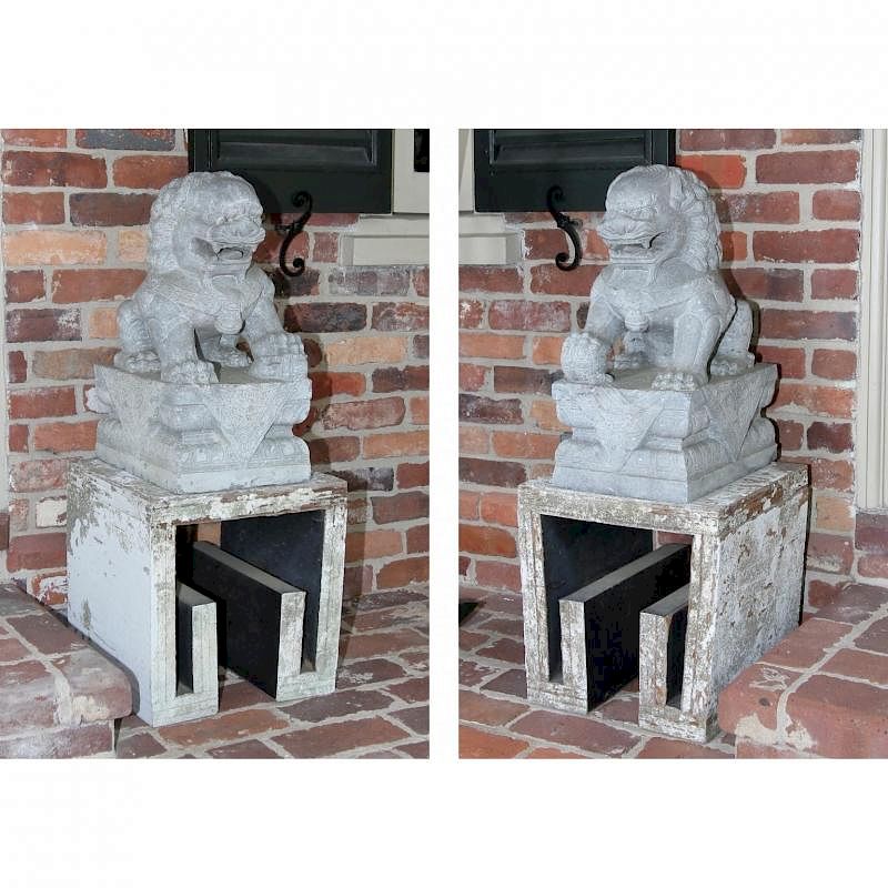 Appraisal: Pair of Carved Marble Asian Foo Dogs each supported on