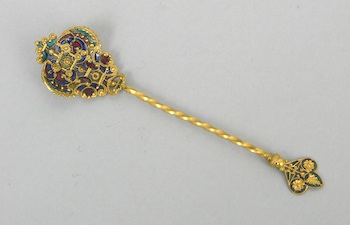 Appraisal: A Plique-a-Jour Enamel Spoon An elaborately designed gilt bowl and