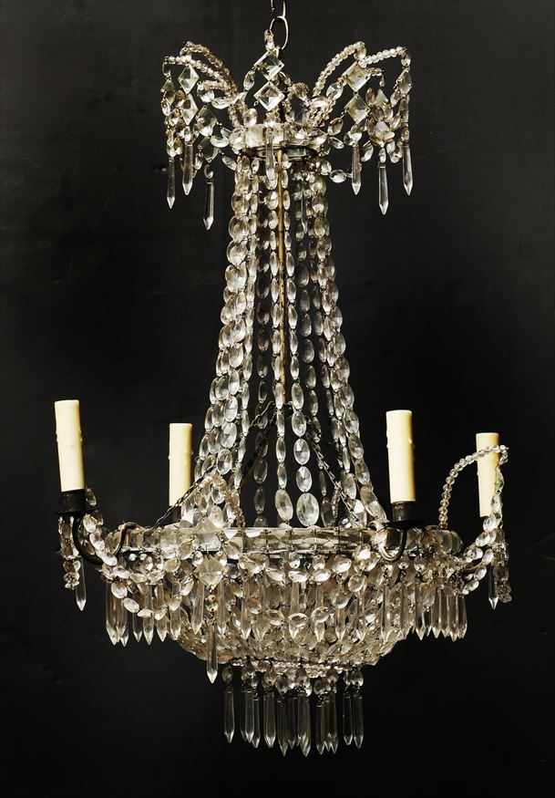 Appraisal: SWEDISH EMPIRE STYLE CUT-GLASS MOUNTED SILVERED METAL FOUR-LIGHT CHANDELIER The