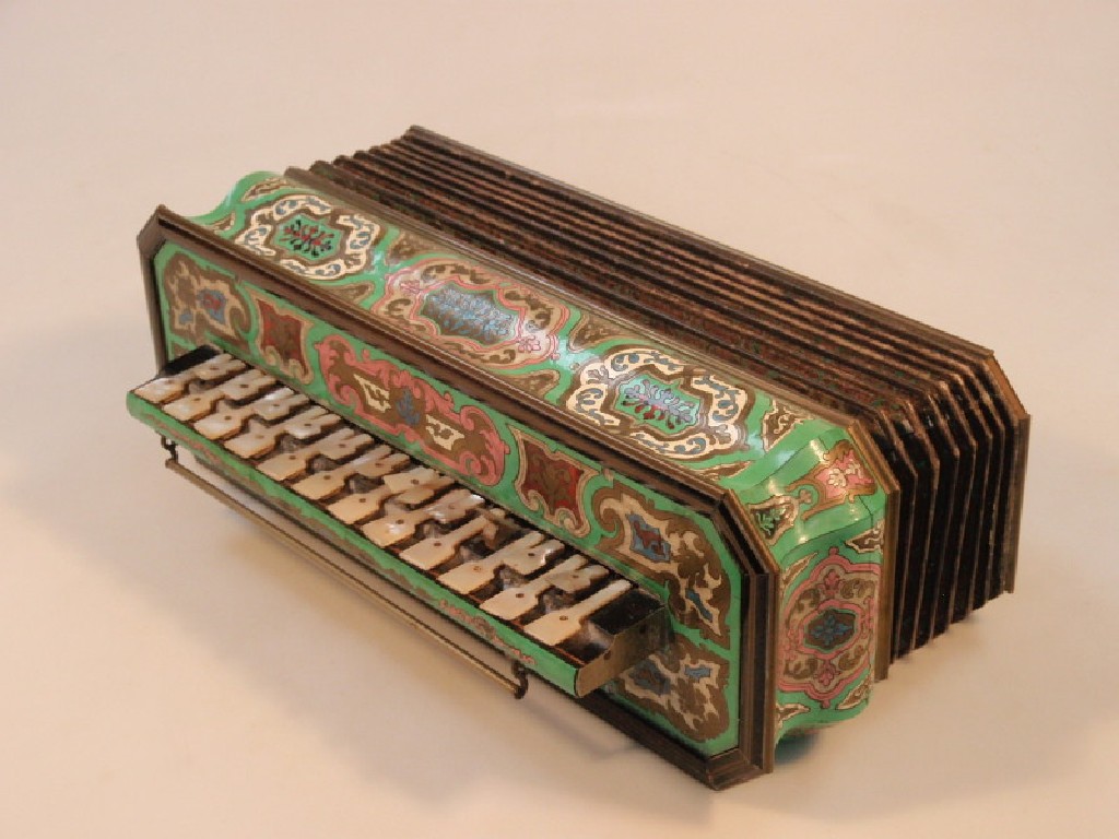 Appraisal: A colourful thC style ebony cased accordion painted with scroll