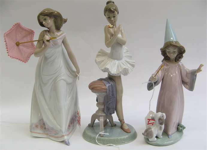 Appraisal: THREE LLADRO GLAZED PORCELAIN FIGURES including Perfect Performance - H