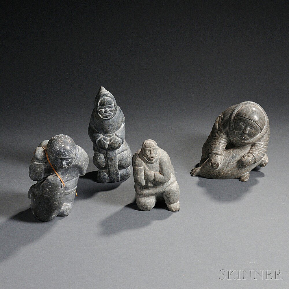 Appraisal: Four Inuit Sculptures Depicting various hunting scenes ht to in