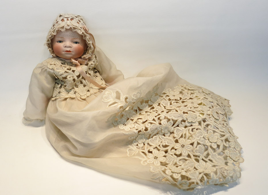 Appraisal: GERMAN BISQUE HEAD BYE-LO BABY DOLL having blue glass sleep