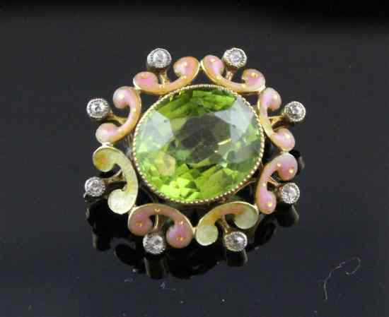 Appraisal: A late Victorian gold enamelled diamond and peridot brooch of