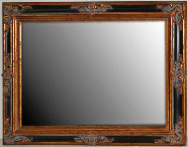 Appraisal: A Baroque style parcel ebonized and giltwood mirror fourth quarter