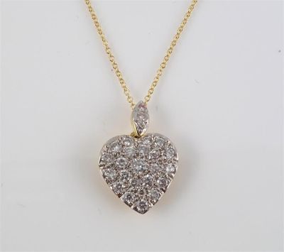 Appraisal: A diamond set heart pendant Set in gold on a