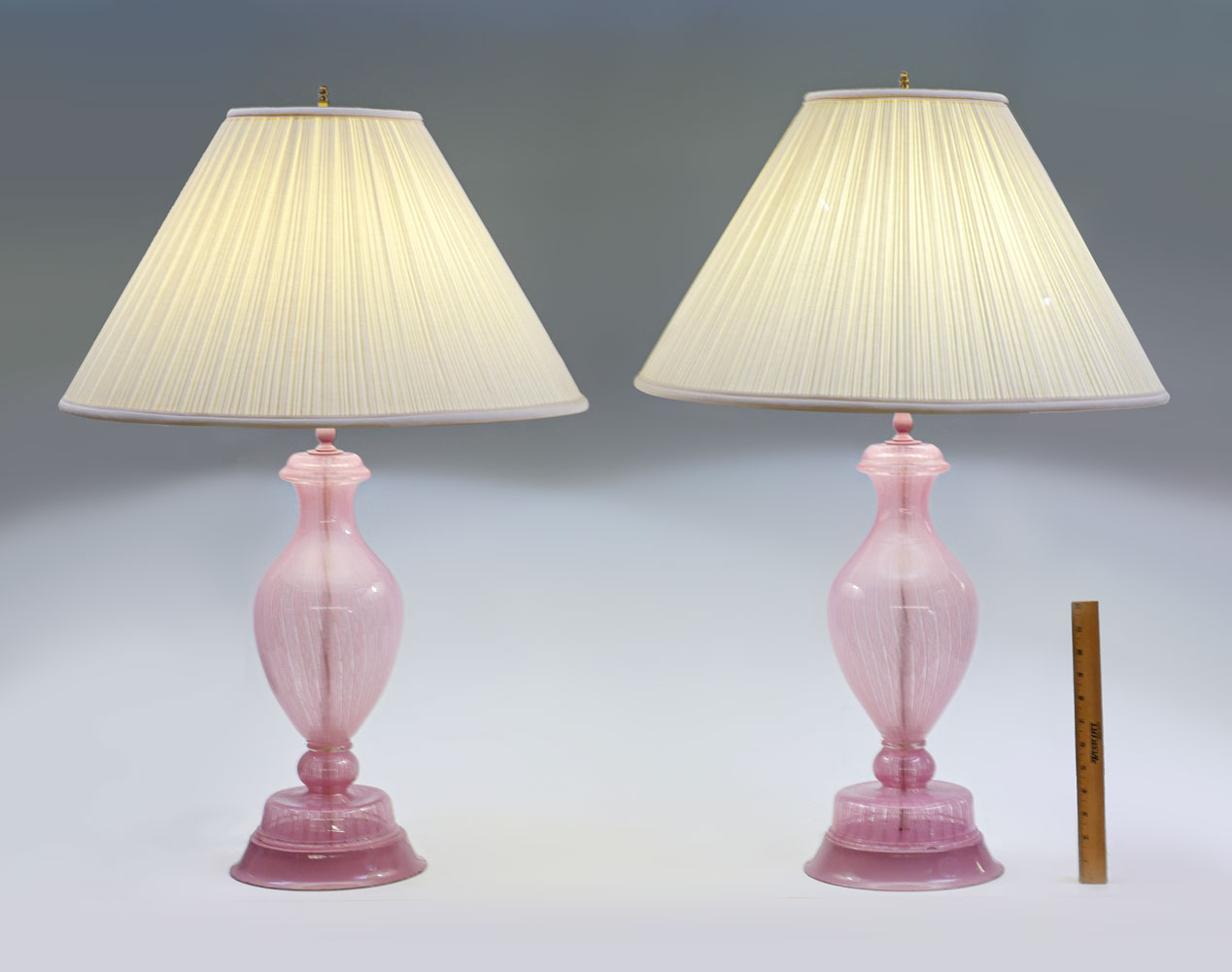 Appraisal: VENETIAN LATTICINO GLASS LAMPS Pair of Venini style Murano lamps