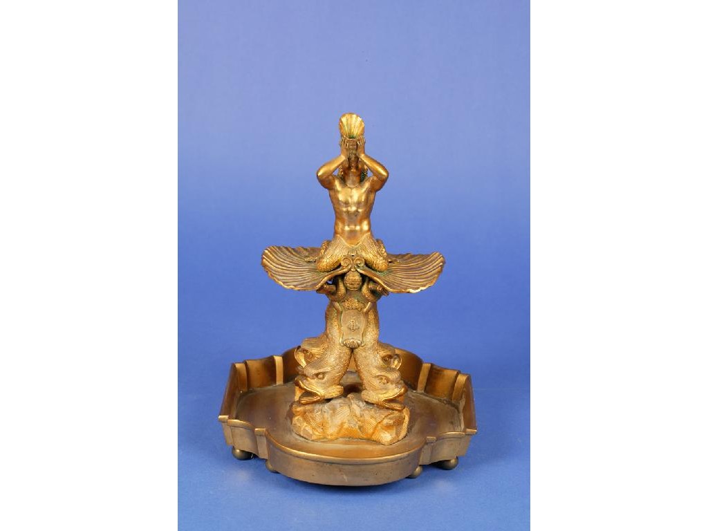 Appraisal: AN ORMOLU MODEL OF A FOUNTAIN with a merman blowing