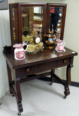 Appraisal: EMPIRE REVIVAL DRESSING TABLE American c having three mirrors over