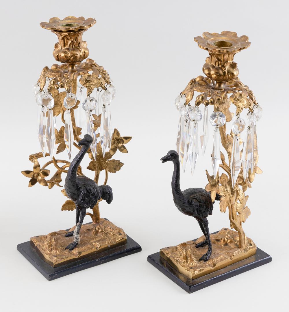 Appraisal: PAIR OF PARCEL GILT-BRONZE OSTRICH CANDLESTICKS PROBABLY FRANCE TH CENTURY