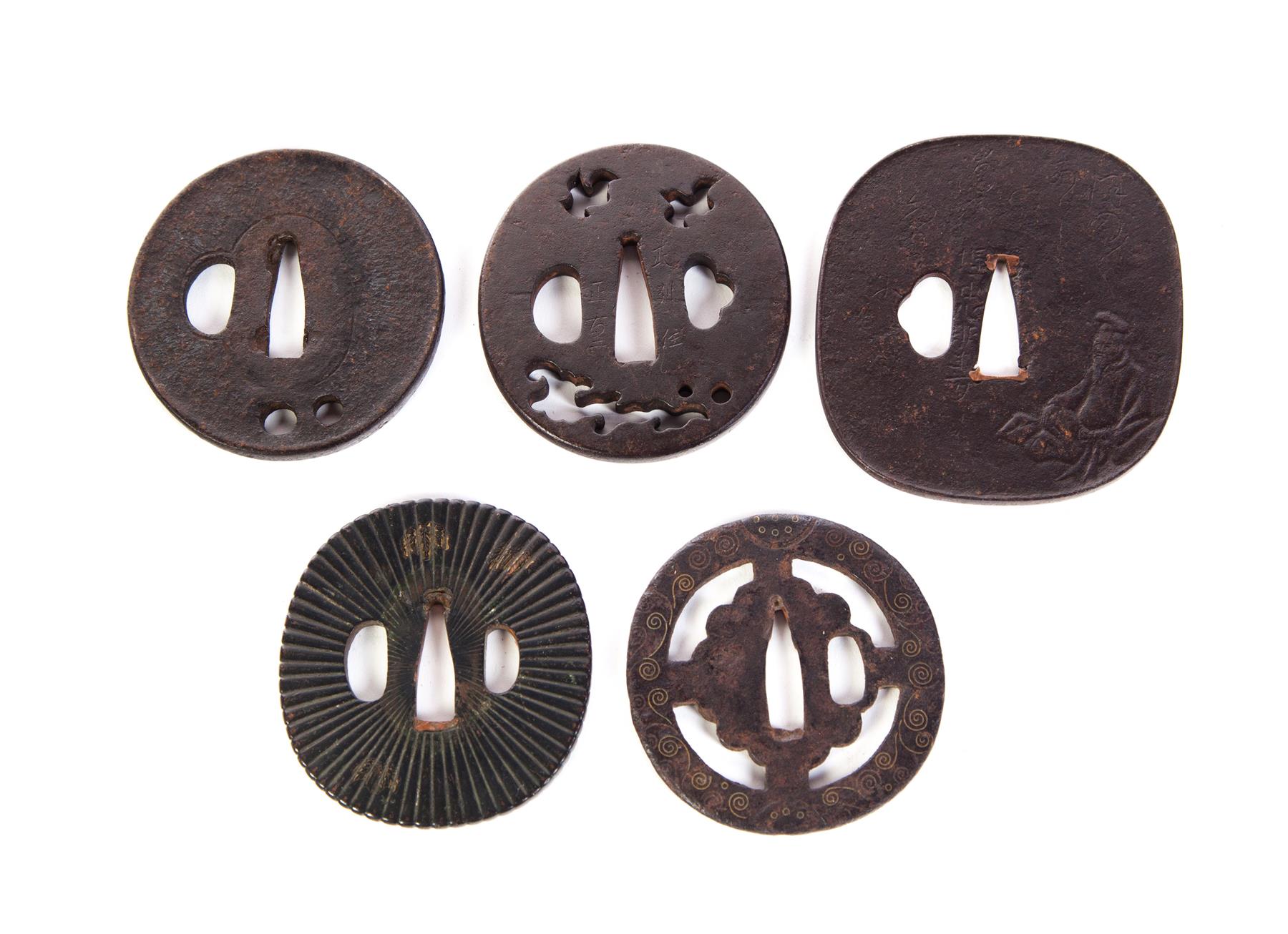 Appraisal: FIVE JAPANESE TSUBA Probably th- th century iron Plain reticulated