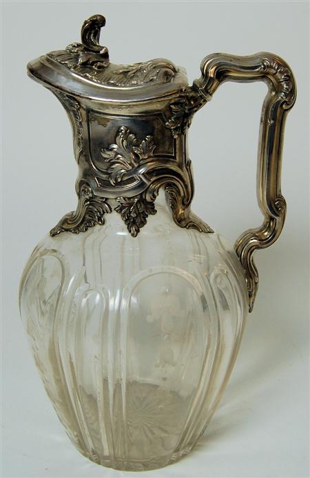 Appraisal: A silver mounted cut glass claret jug Sheffield the fluted