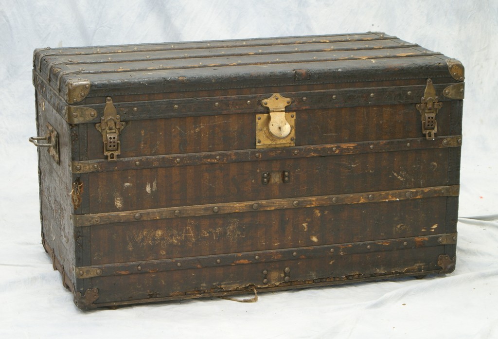 Appraisal: Slatted flat top trunk with Louis Vuitton paper label on