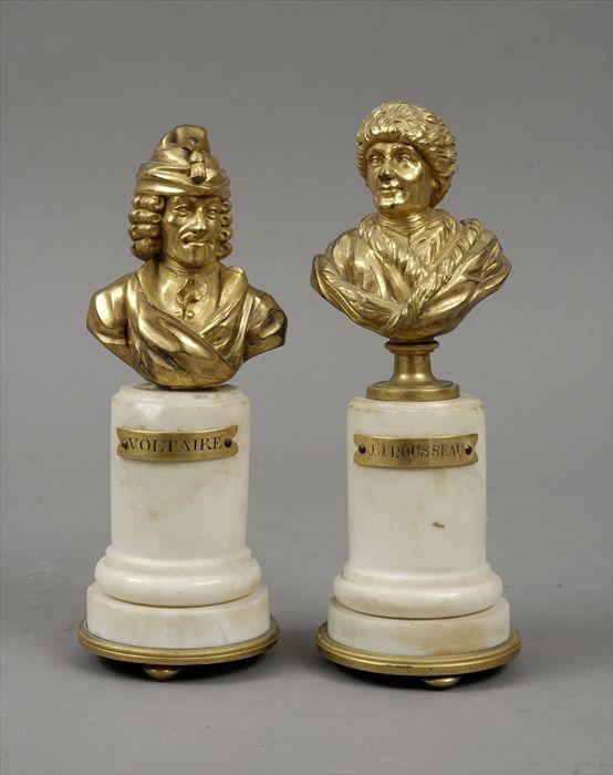 Appraisal: Pair of Gilt-Bronze Busts of Voltaire and Rousseau on Marble