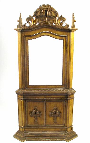 Appraisal: A Baroque style parcel gilt hardwood cabinet with paneled door