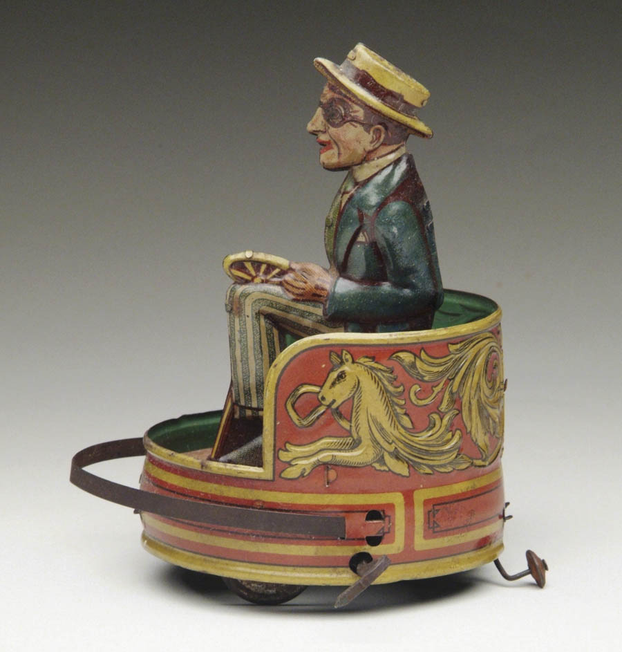 Appraisal: HAROLD LLOYD BUMPER CAR Ca s Scarce wind-up toy featuring