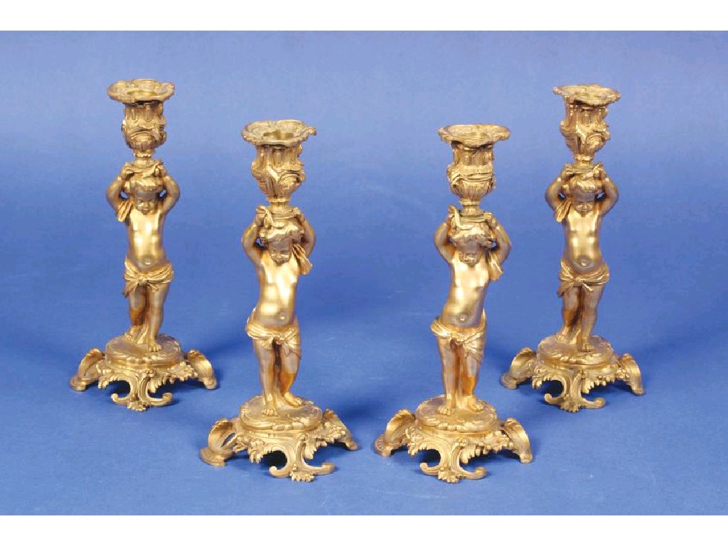 Appraisal: A SET OF FOUR TH CENTURY STYLE ORMOLU CHERUB TABLE