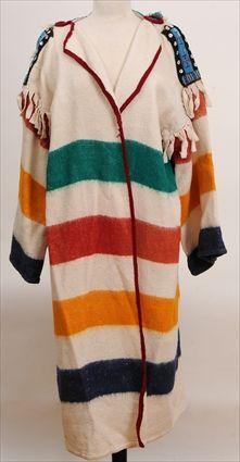 Appraisal: NORTHERN PLAINS CAPOTE AND LEGGINGS Capote with beaded epaulets and