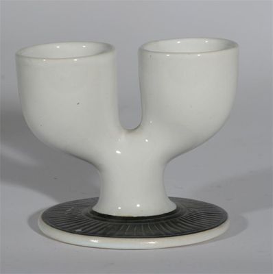 Appraisal: A Troika Pottery white Double Egg cup glazed white with